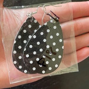 Never worn! Poka-dot teardrop leather earrings in black and white.